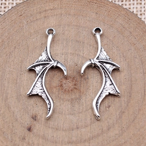 Retro silver alloy bat wing pendants set with vintage texture for jewelry making
