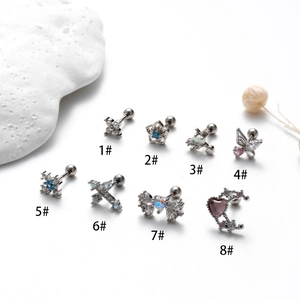 Piercings d'oreille en acier avec motifs croix papillon et zircons en coloris argent