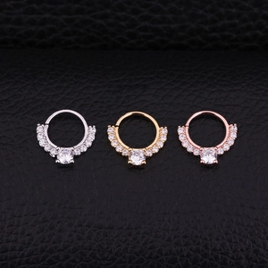 Micro-paved zircon septum rings in silver, gold, and rose gold finishes on black leather