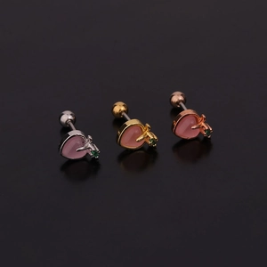 Set di tre orecchini a cuore in argento oro e oro rosa con pietre rosa e cristalli verdi