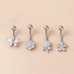 Set of four silver stainless steel navel rings featuring butterfly and floral cubic zirconia