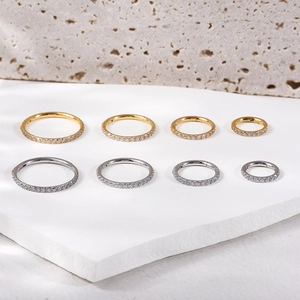 Detailed comparison of gold and silver hinged segment rings in four different diameter sizes