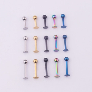 Detail view of 316L stainless steel labret studs in five colors and three sizes