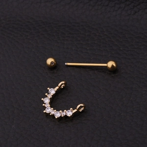 316L stainless steel gold nipple ring with cubic zirconia shield on black leather
