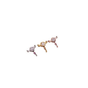 Orecchini a bacchetta con stella e zirconi in finiture argento, oro e oro rosa