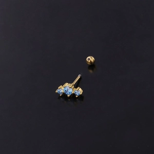 Golden stainless steel cartilage stud with three blue zircons and screw back ball
