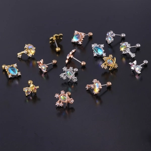 Elegant moonstone ear studs with celestial patterns in gold and silver finish