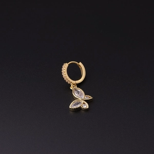 Detail of a gold butterfly earring with micro-pave zircons and marquise crystals
