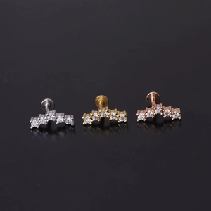 Three-piece set of curved labret studs with five micro-set zircons in silver, gold, and rose gold