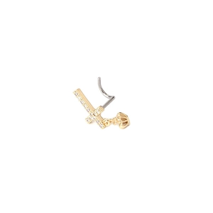 Detail of titanium steel nose stud with zircon cross and small crown pendant charm