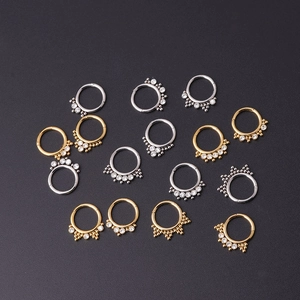 Surgical stainless steel daith rings with CZ zircon crystals in gold and silver finish