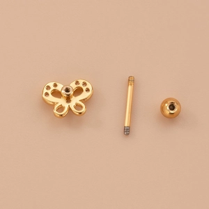 Pendiente de mariposa hueca en acero inoxidable dorado con circón y cierre de tornillo