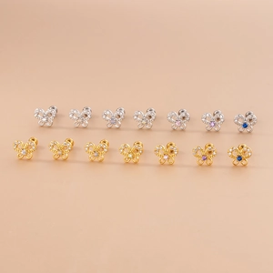 Pendientes de mariposa huecos en oro y plata con piedras de circón multicolor