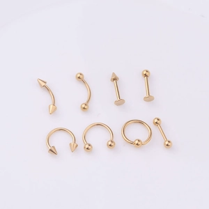 Detailed set of 8 gold stainless steel body piercings including hoops and barbells