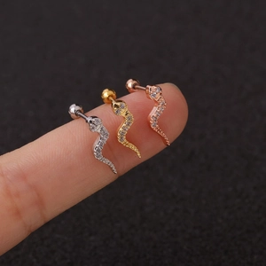 Detailed close-up showing snake-shaped stud earrings with micro-paved cubic zirconia