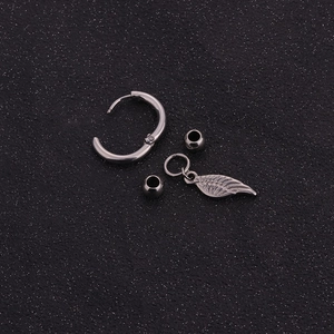 Polished silver stainless steel hoop earring set with a cross and feather pendant charm