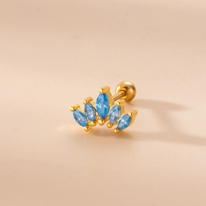 Detailed close-up of golden crown stud earring featuring blue marquise-cut cubic zirconia