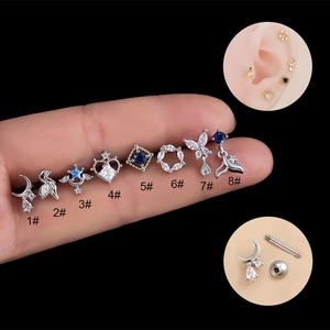 Surgical steel cartilage studs set with butterfly and zircon stones in blue and silver