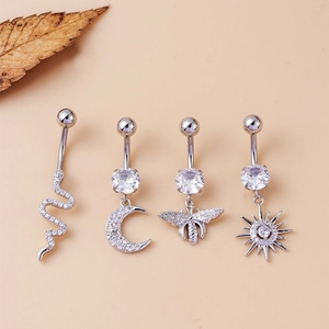 Silver belly rings set with snake, moon, bee, and sun pendants and clear CZ stones