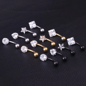 Macro display of 12 curved navel rings in star, heart and round zircon shapes