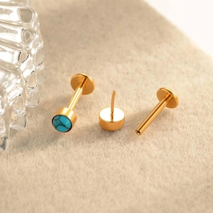F136 titanium labret piercing set with turquoise stone and golden flat back studs