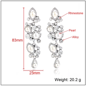 Long layered pearl tassel earrings with rhinestones measuring 83mm by 23mm