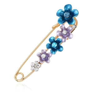 Broche épingle de sûreté florale avec fleurs en émail bleu et violet et strass brillants