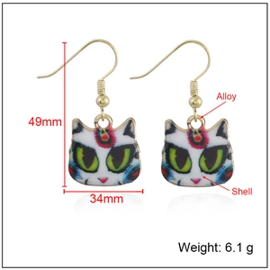 Cat head earrings with red crescent moon design made of shell and alloy for women