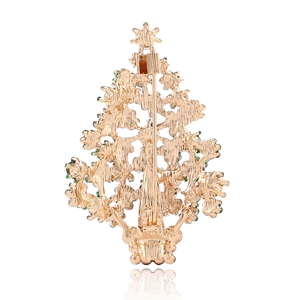 Back view of golden Christmas tree brooch with secure vertical pin and green accents