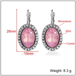 Elegant oval pink crystal earrings with rhinestone border and alloy French clip fastening