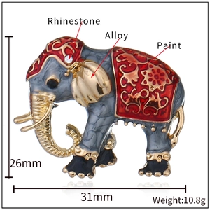 Charming enamel elephant brooch with red saddle and rhinestones, sized 31mm by 26mm