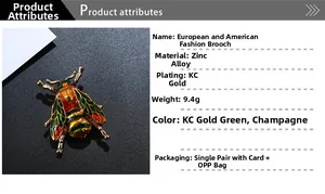 Detailed view of enamel insect brooch crafted in zinc alloy with green and orange tones