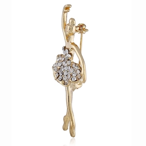 Detailed side view of golden ballerina brooch featuring a crystal-encrusted tutu and pin