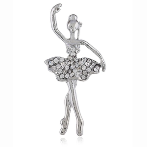 Macro detail of ballerina brooch with sparkling crystals on silver alloy finish