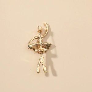 Elegant gold ballerina brooch with textured finish shown from the back view
