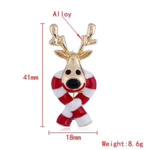 Christmas reindeer brooch with gold alloy and red striped scarf accessory for festive style