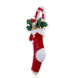 Festive Christmas stocking brooch with enamel candy cane and holly leaf design