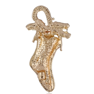 Golden Christmas stocking brooch back detail with safety pin and frosted metal texture