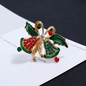 Christmas bow bell brooch featuring red and green rhinestones on gold alloy base