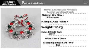 Detail view of festive wreath brooch with red and green rhinestones and bow design