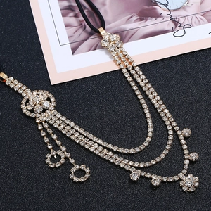 Detail of multi-layer sparkling floral rhinestone headband with elastic strap for brides