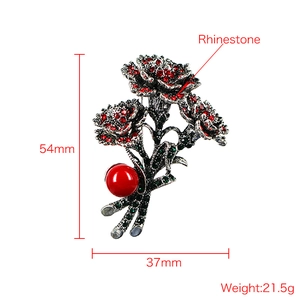 Vintage carnation floral brooch with red rhinestones and imitation pearl decoration