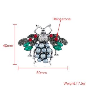 Detailed macro view showing the 50mm x 40mm dimensions of the vintage bee brooch