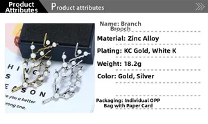 Détail de broches en forme de branche dorée et argentée avec perles blanches élégantes