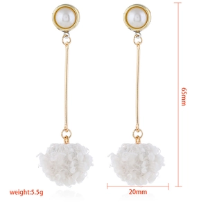 Elegant long pom-pom earrings with white pearls and gold metal rods on white background