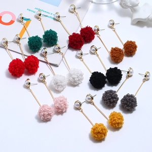 Winter style faux pearl earrings with fluffy mink hair pom poms in multiple colors