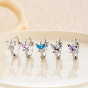 Set of five silver butterfly huggie hoop earrings with colorful zircon gemstones