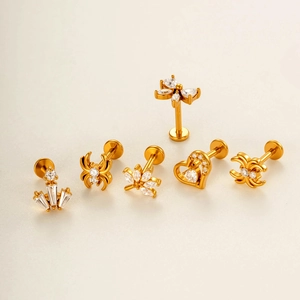 Set de labrets en acero dorado con circonitas de mariposa y corazón para piercings oreja