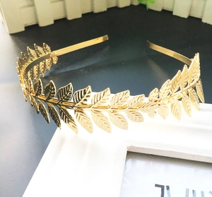 Golden laurel leaf headpiece with polished metallic finish in vintage Greek style