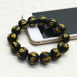 Bracciale in perle di vetro cristallo con mantra a sei parole dorato su sfere nere